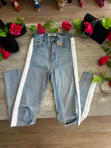 Jeans à bandes blanches